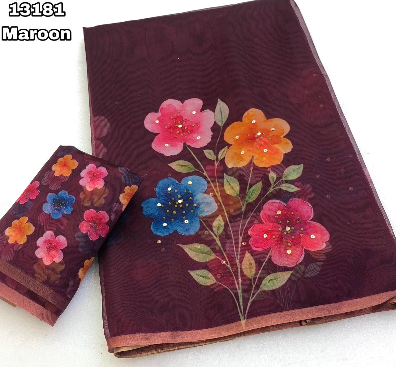 Maroon Organza Saree with Pink Floral Digital Print and Gold Zari Border.